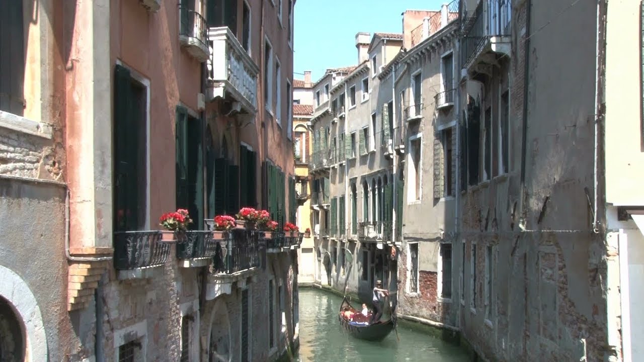 Sidewalk Talk: "Would You Rather Visit a European Country or on a Tropical Island?"